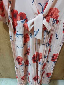 Pleated floral dress with front tie up
