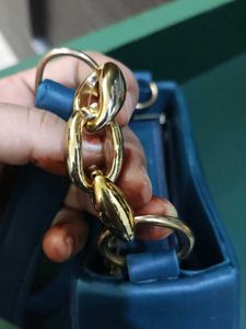 Stylish Blue Handbag with Gold Chain