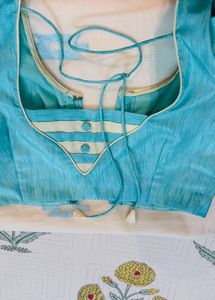 Cream Saree with Blue Embroidery blouse