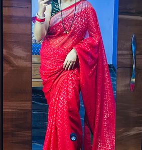 Vibrant Red Saree with Intricate Silver Weave
