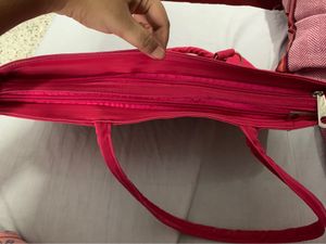 Brand new spacious sidebag or handbag in Rani pink or fusia pink colour