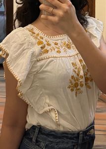 Embroidered Flutter Sleeve Top