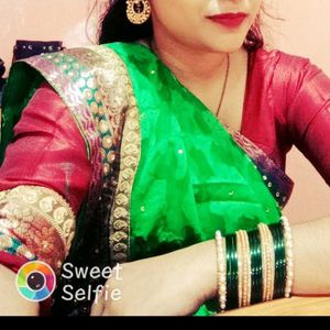 Vibrant Green Saree with Embellished Border