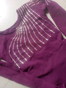 Elegant Purple Gown with Bell Sleeves
