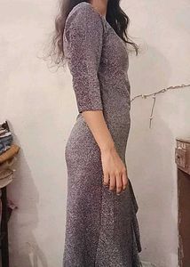This is a grey stretch knit metallic long party dr