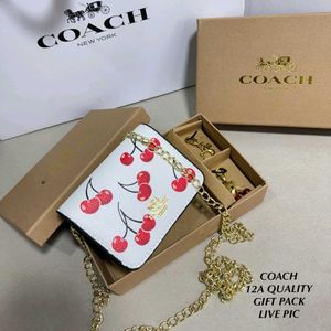 Coach Wallet sling n charm in box packing