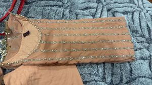 Elegant Peach Kurta with Embellishments