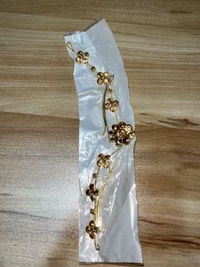 Exquisite Gold hair buns with Floral Design