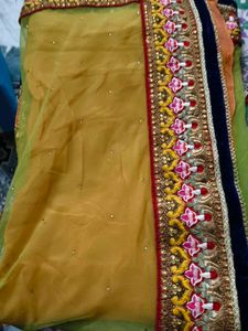 net embroidery saree with velvet blouse