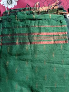 Elegant Teal Saree with Golden Motifs