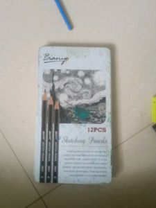 Artist Sketching Pencils