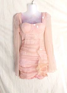 52264. Sheer Sleeve Ruffle Dress