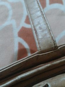 Stylish Tan Shoulder Bag with Scarf Accent