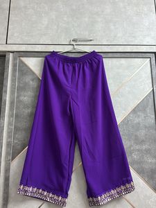 Elegant Purple Kurta Set with Intricate Embroidery