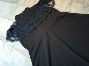 Elegant Black Dress with Lace Detail