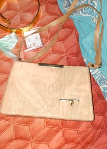Elegant Clutch Bag with Gold Accents