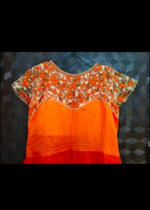 Elegant Orange Embroidered partywear Gown