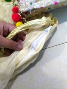A Multi Colour Blouse , White Skirt
