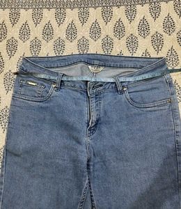 Distressed Blue Narrow Jeans