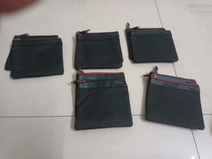 TUMI Pouches - Stylish & Versatile