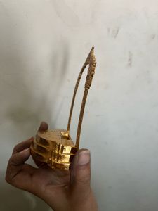 Gold colored Show piece