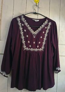 burgundry short kurti with minor flaw