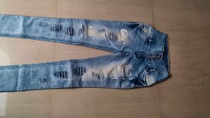 Denim Distressed Shorts with Button Detail