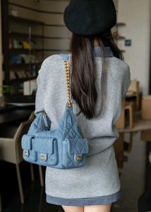 Chanel denim cargo slingbags
