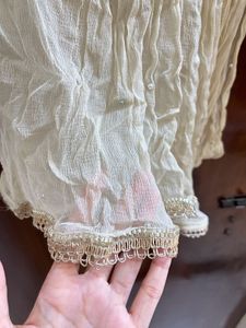Elegant Cream Silk Blouse with Embellishments