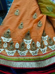 net embroidery saree with velvet blouse