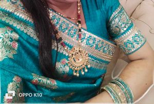 Beautiful Teal Saree with Intricate Weaving