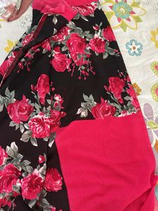 Elegant Black Saree with Pink Roses
