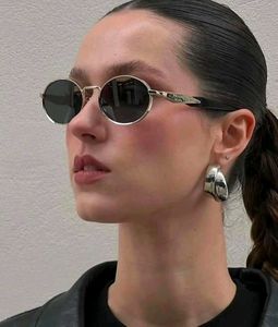 Prada Sunglasses - Round Metal Frame
