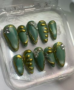 Cat Eye Press-On Nails with Gold Swirls