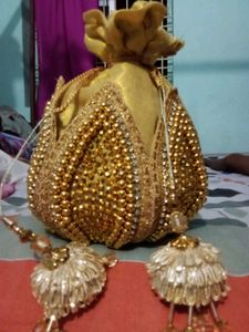 Exquisite Golden Potli Bag