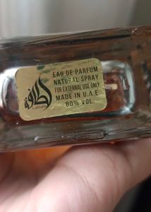 lattafa Oud Mood Perfume Bottle