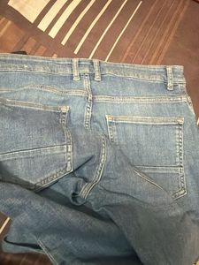 Light Wash Distressed Denim Jeans