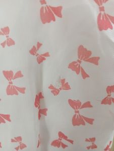Sleevless White Dress With Red Bows