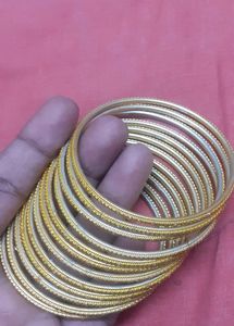 Golden steel Bangles