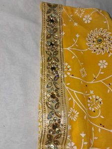 Yellow kurta with churidar and dupatta