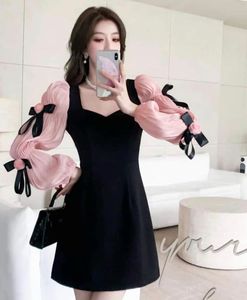 Chic Black dress with Pink Puff Sleeves