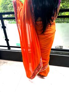Vibrant Orange Embroidered Saree