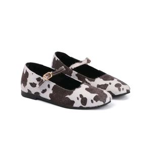 pair of multicoloured Mary Janes