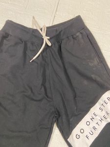 Black Joggers with "Go One Step Further" Print