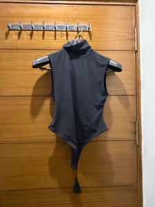 Sleek Black Turtleneck Sleeveless Bodysuit