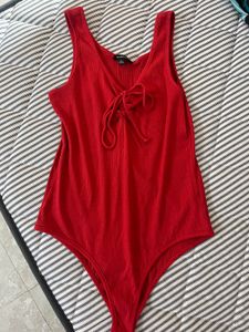 Vibrant Red Lace-Up Ribbed Bodysuit
