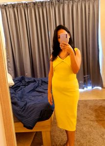 Yellow Sleeveless Dress with Open Back