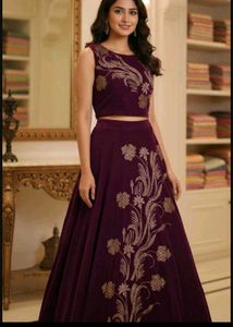 bust 40 Elegant Maroon Embroidered Lehenga Set