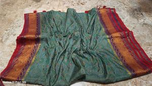 Exquisite Teal Saree with Red Blouse
