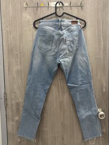 Light Wash Distressed Denim Jeans